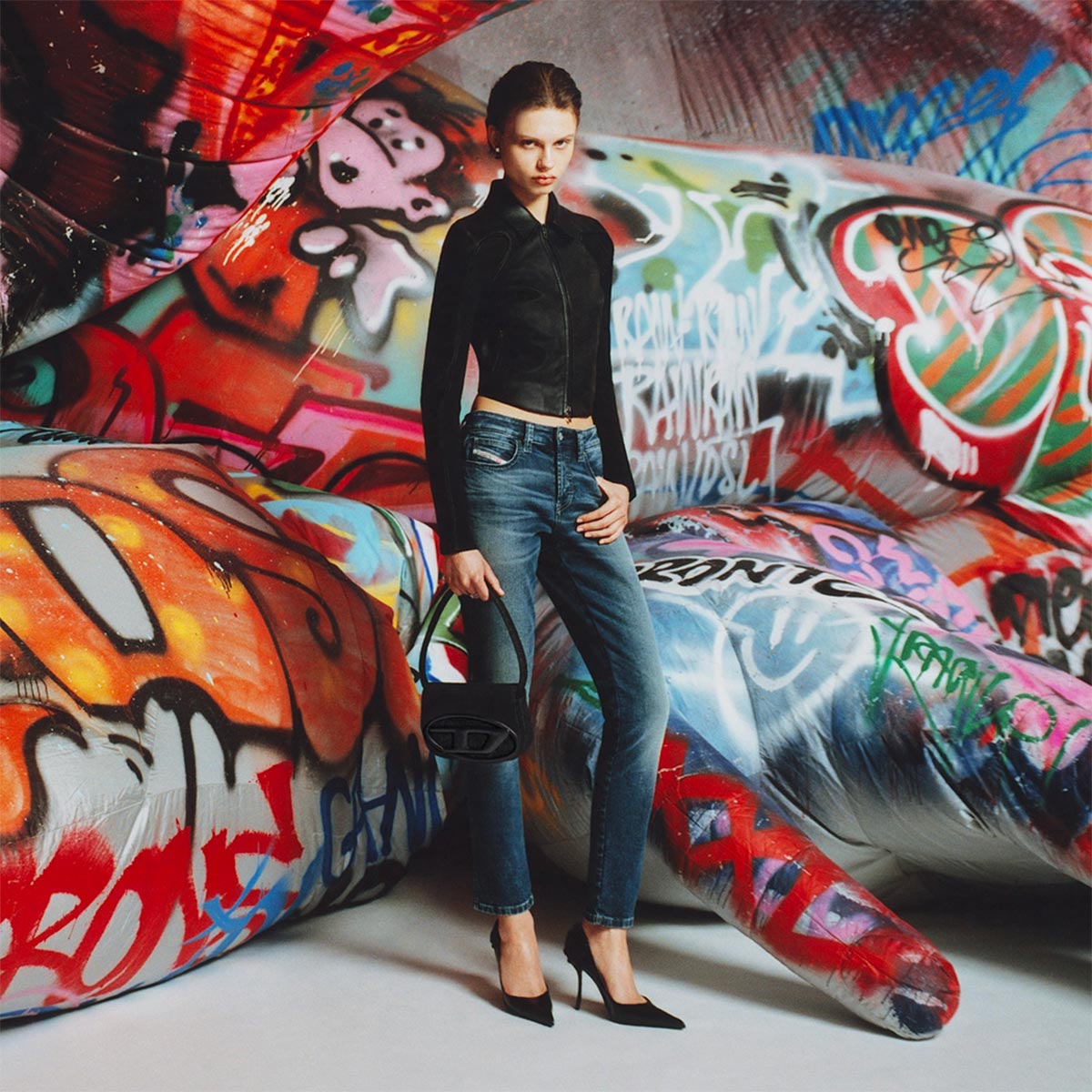 A woman wearing Diesel jeans