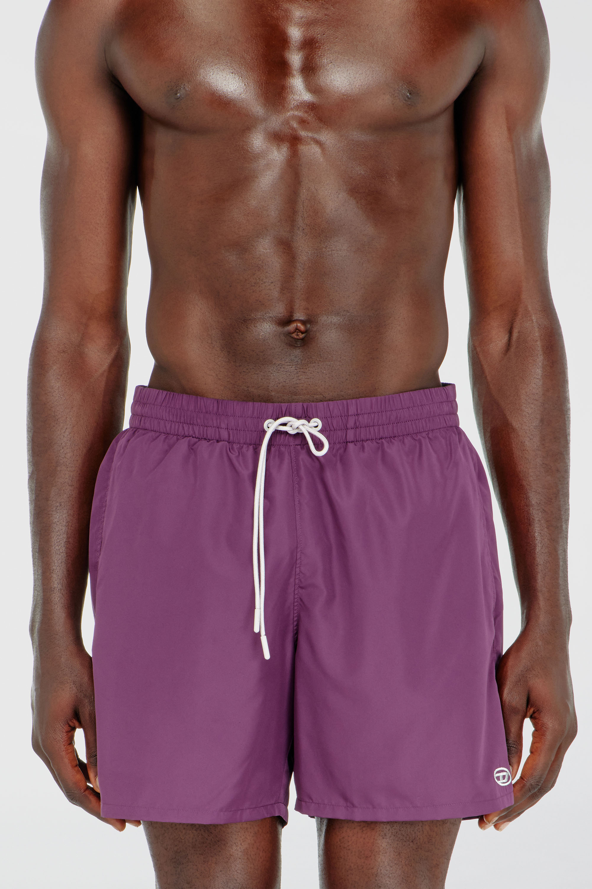 Swim shorts with metallic Oval D logo