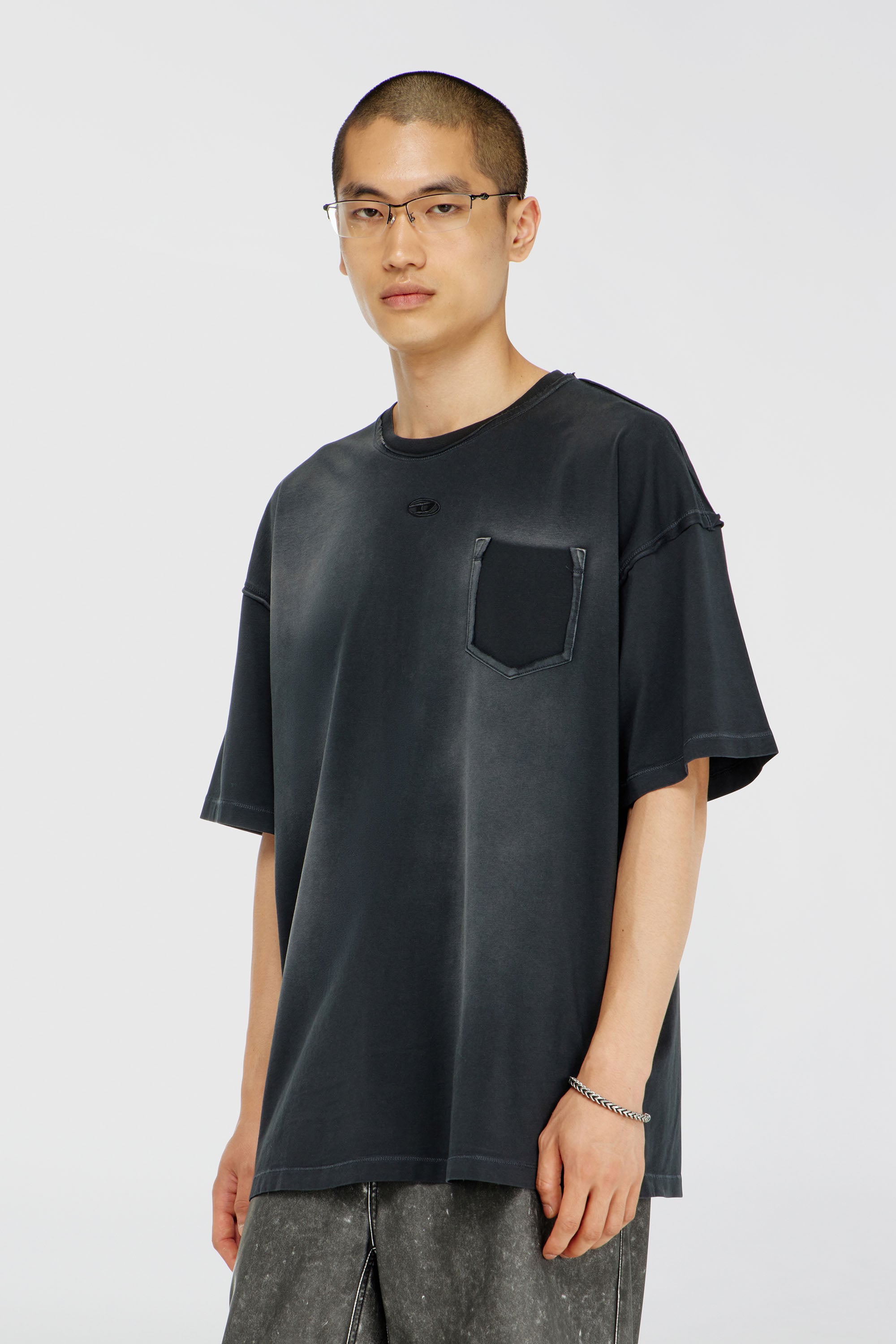 Diesel - T-POCK, Man's Faded T-shirt with ripped pocket detail in Black - 1